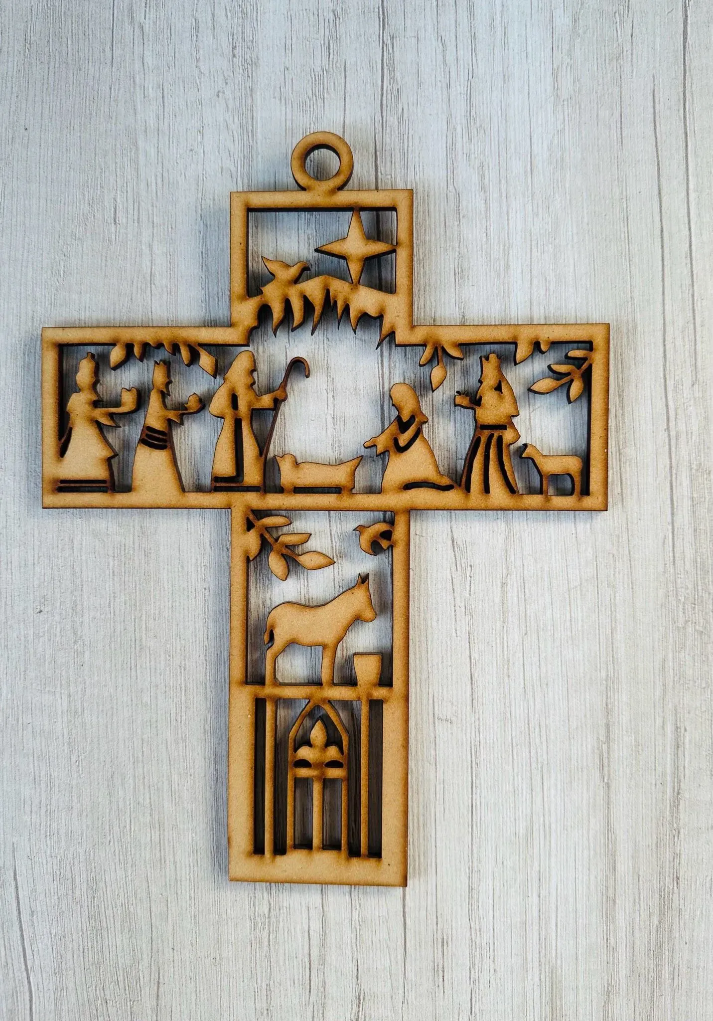 Cruz nacimiento colgante