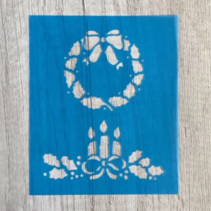 stencil corona y velas navideñas