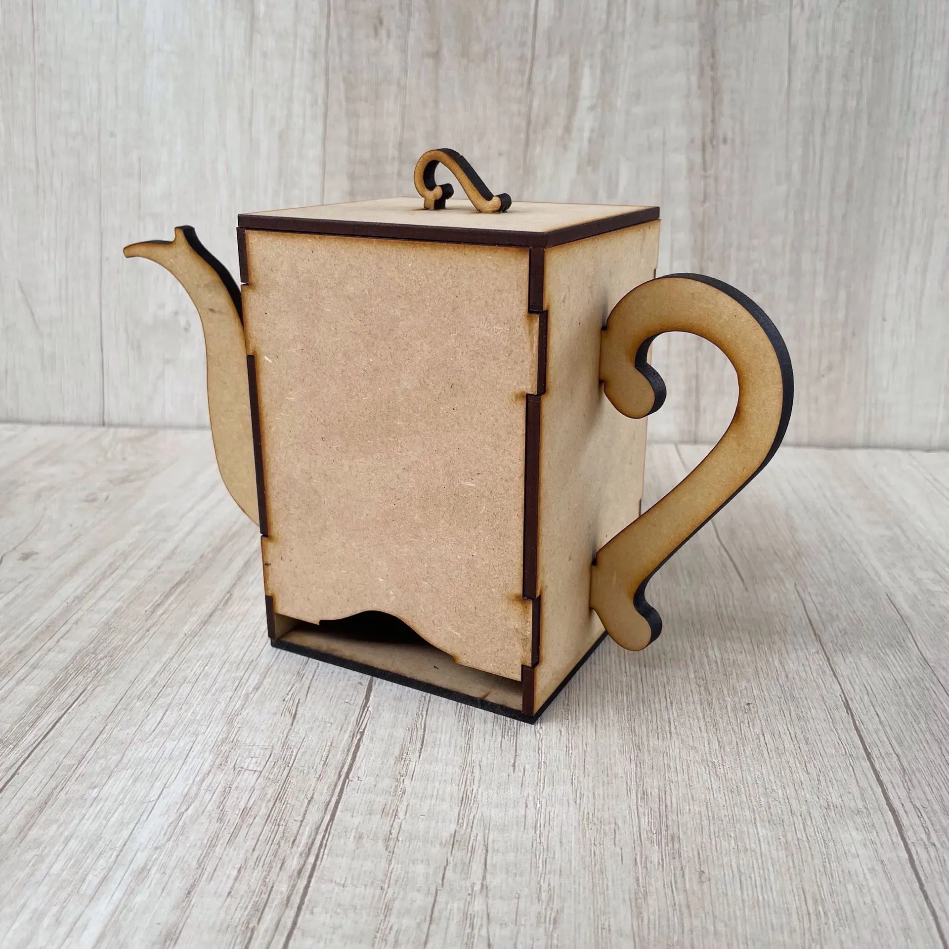 Dispensador de bolsitas de té, tetera